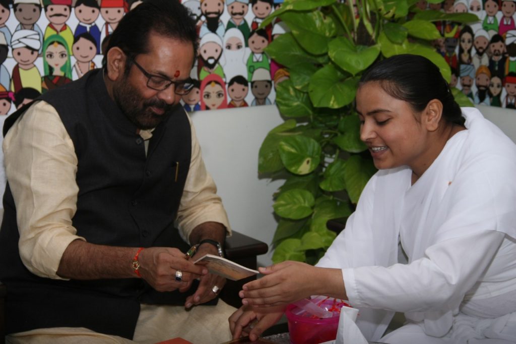 Delhi Inderpuri - Tying Rakhi to Mukhtar Abbas Naqvi, Union Minister of Minority Affairs